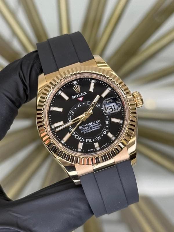May be an image of wrist watch and text