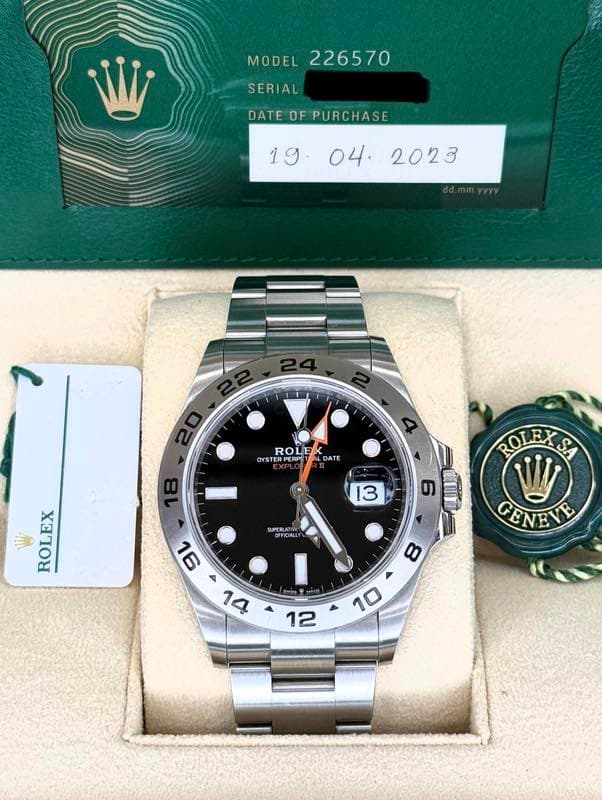 May be an image of wrist watch and text that says 'MODEL 226570 SERIAL DATE DATEOFPURCHASE OF PURCHASE ROLI OYSTE OYSTERPERP PERP 4 DATE il ROLEX EX 13 6 ROLEXS4 SUPERLATING…