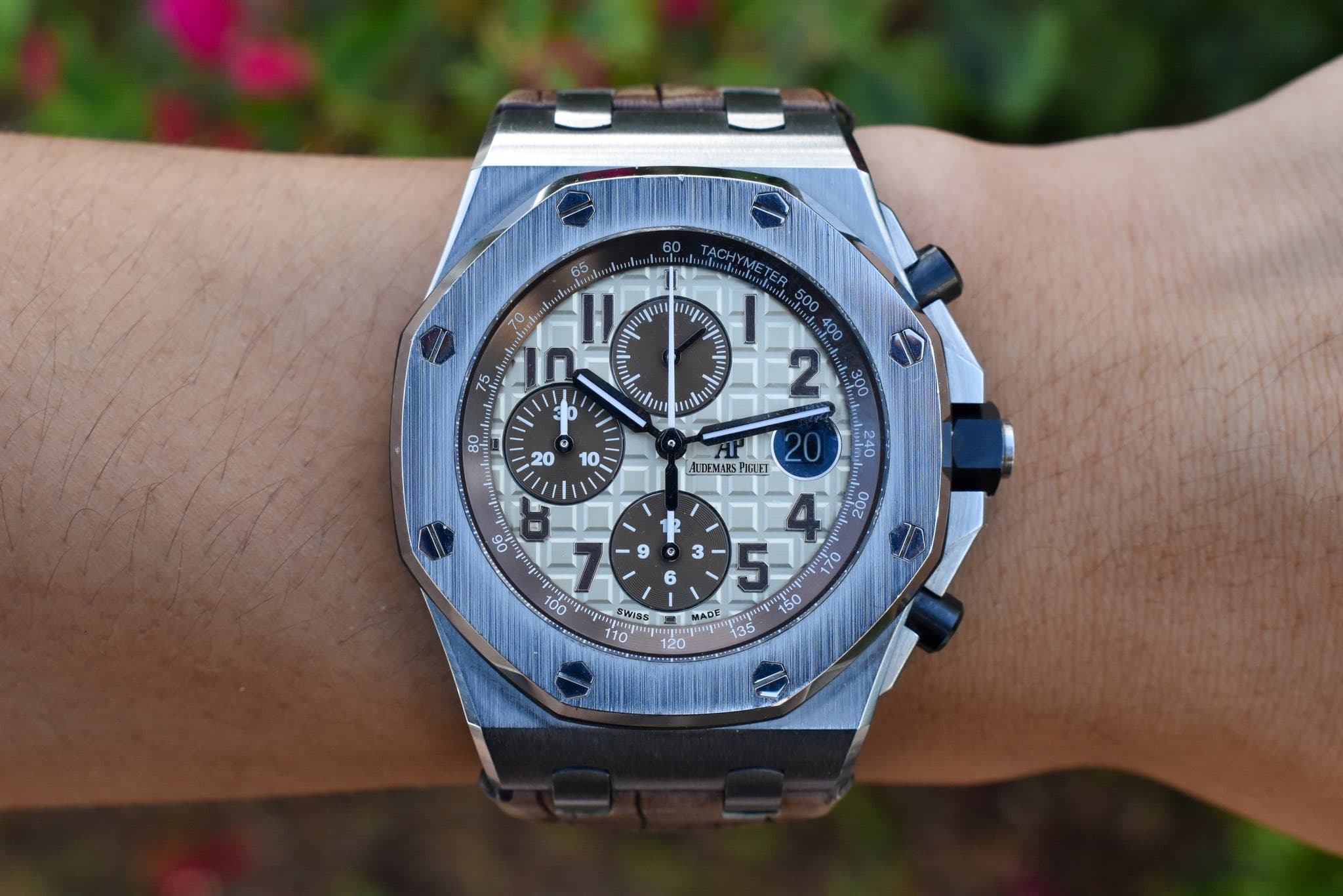 May be an image of wrist watch and text