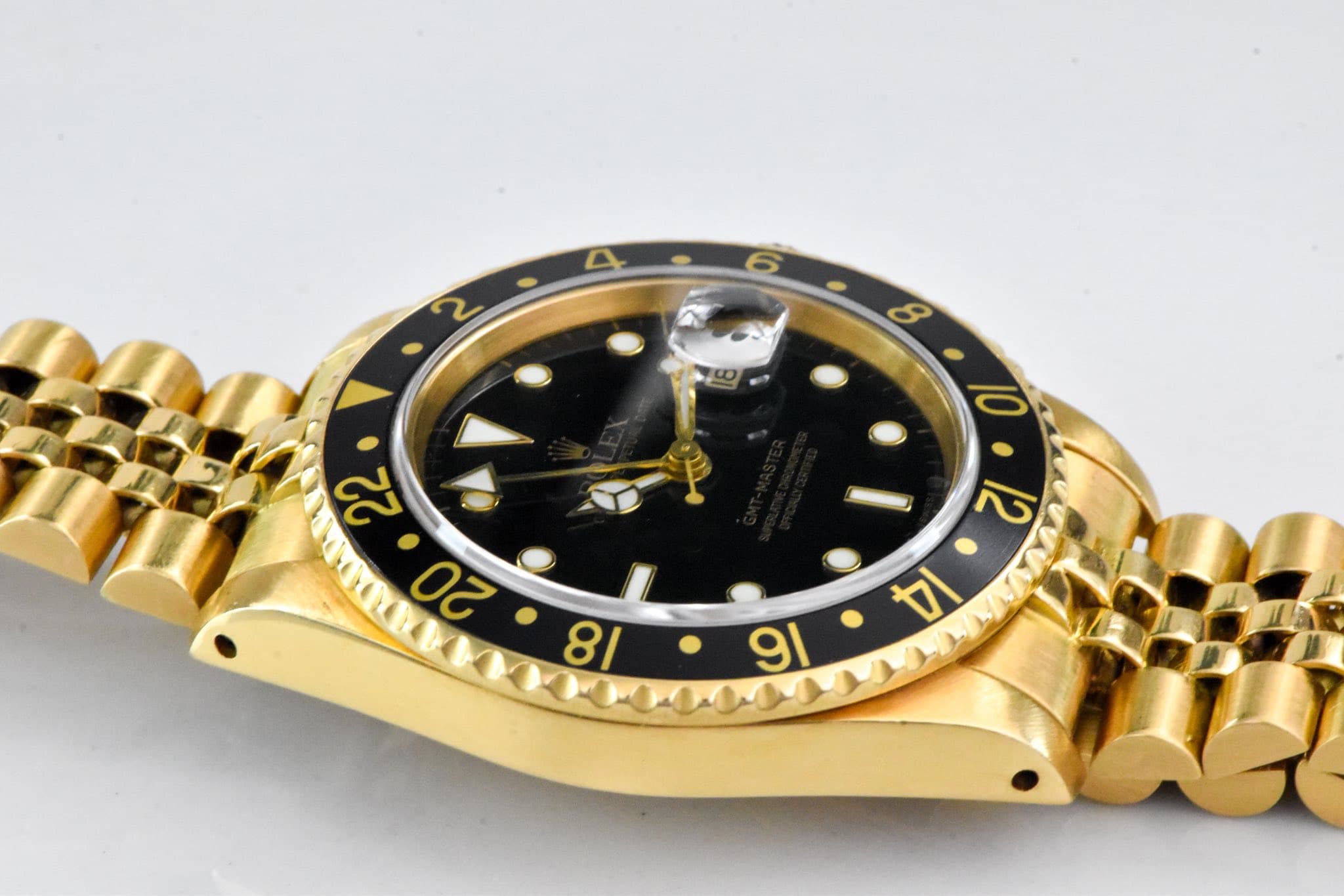 May be an image of wrist watch and text