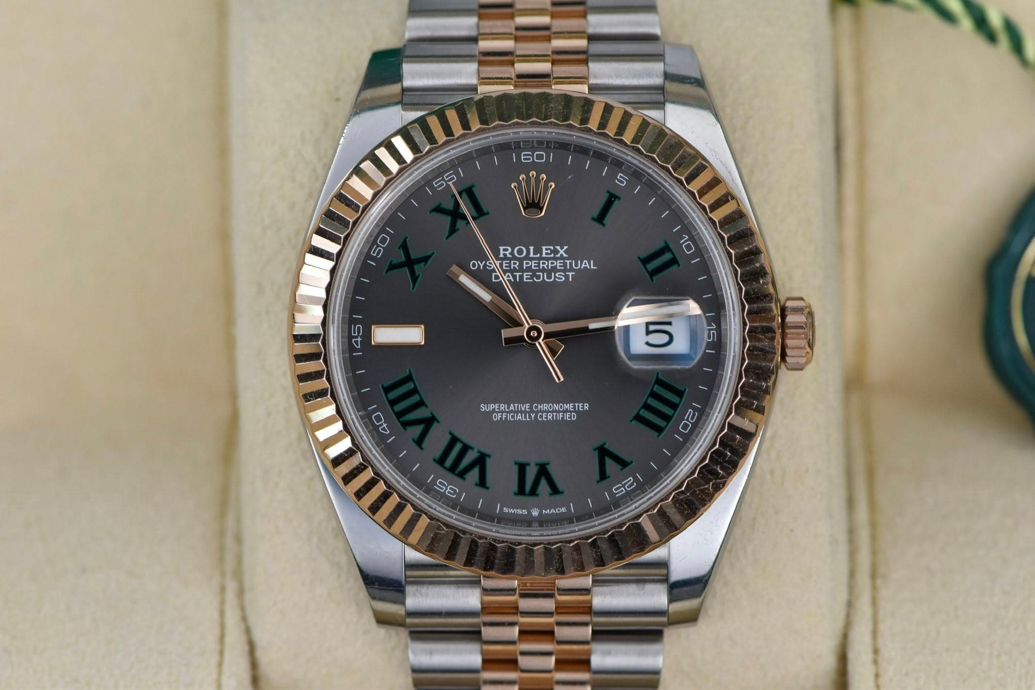 May be an image of wrist watch and text that says '60 5S 50 ROLEX EX OY REJUSTUAL ER PERPET TUAL ATEJUST SUPERLATIVE SUPERLATINE.CHRONOMETER OFFICIALLYCERTIFIED…
