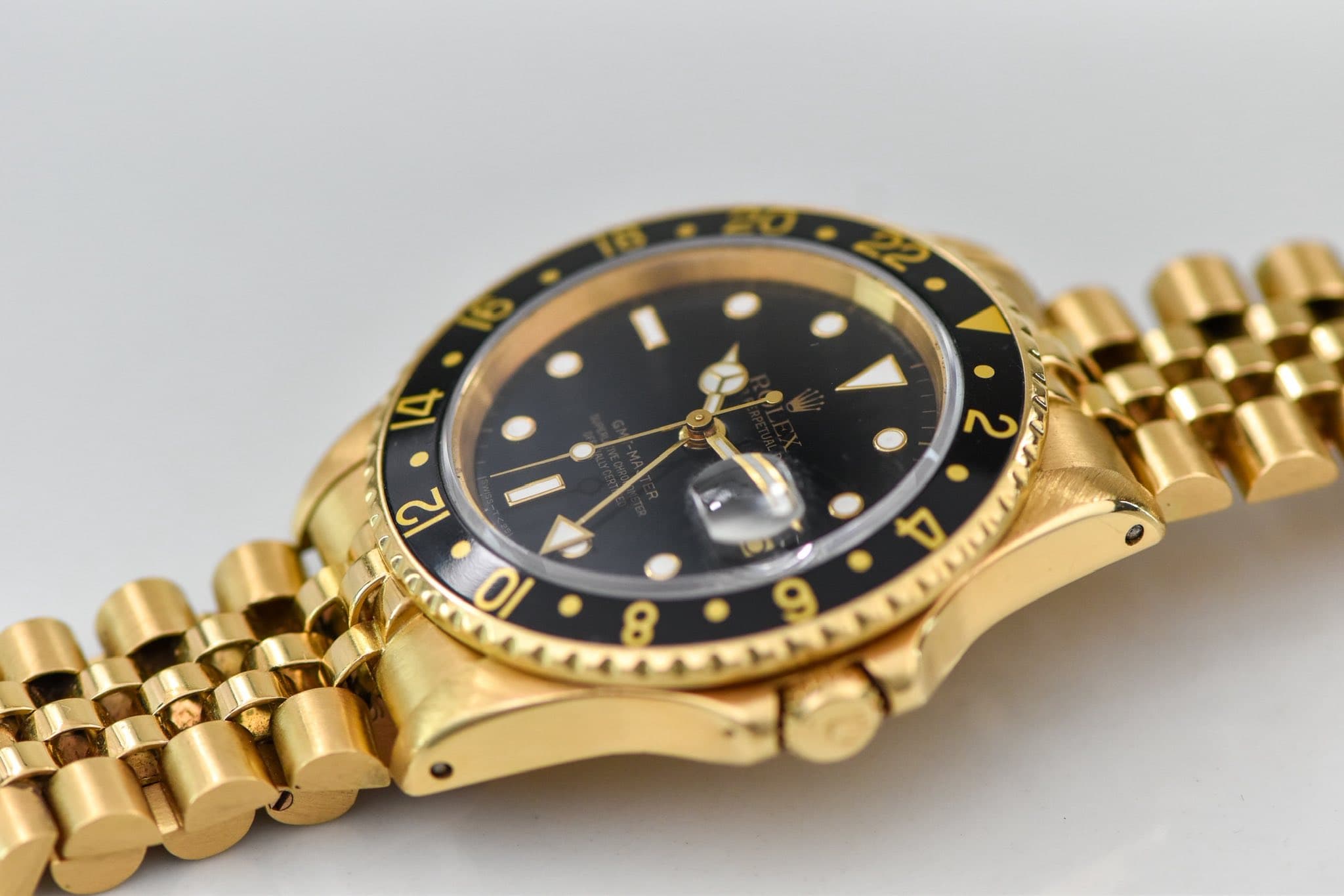 May be an image of wrist watch and text