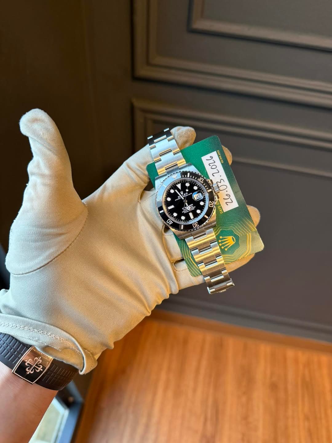 May be an image of wrist watch and text