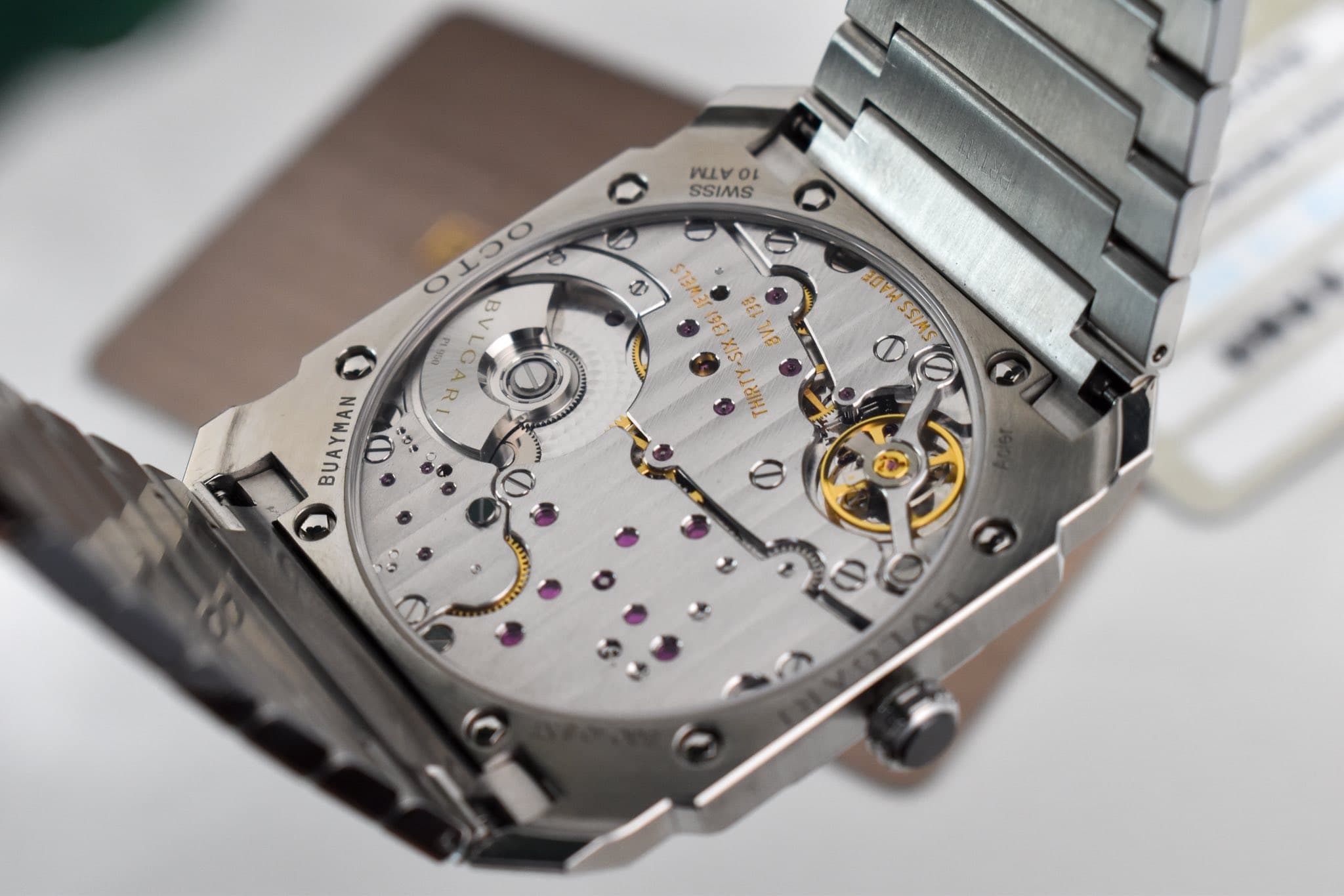 May be an image of wrist watch and text that says 'VAV 10 01 SSIMS S 2 2 O OOT e 8 O หลน မ BUAYMAN O :a y รอา ADA 1 SUVASSIM BUVA O 0 SSIMS THIRTN e'