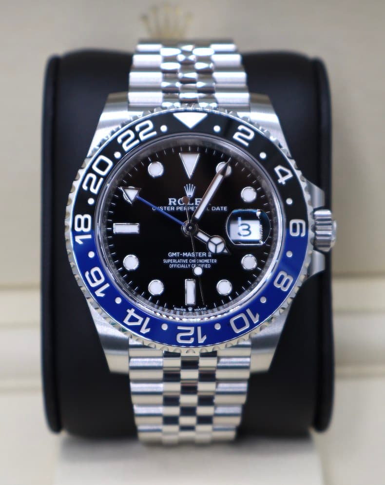 May be an image of wrist watch and text
