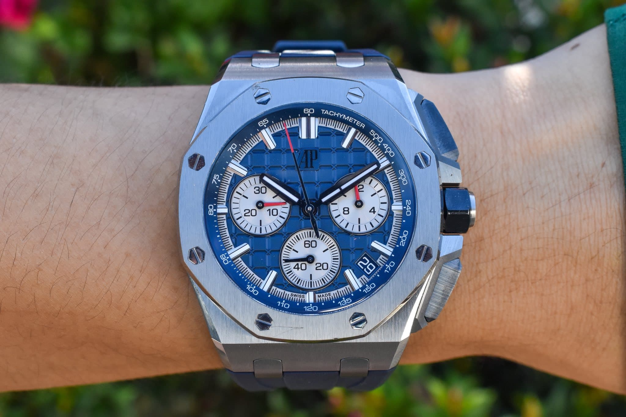 May be an image of wrist watch and text