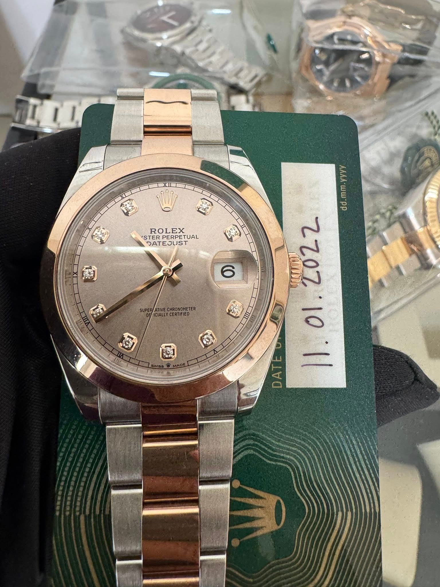 May be an image of wrist watch and text that says 'ROLEX STE POLETUAL ERPERPE TERPE PERPETUAL PETUAL DATESUST EJUST 3AT R ርያ 6 ድን ALLYCERIFED (ለሰላ U "Ww-pp KO 2202 IIIL DATE /.…