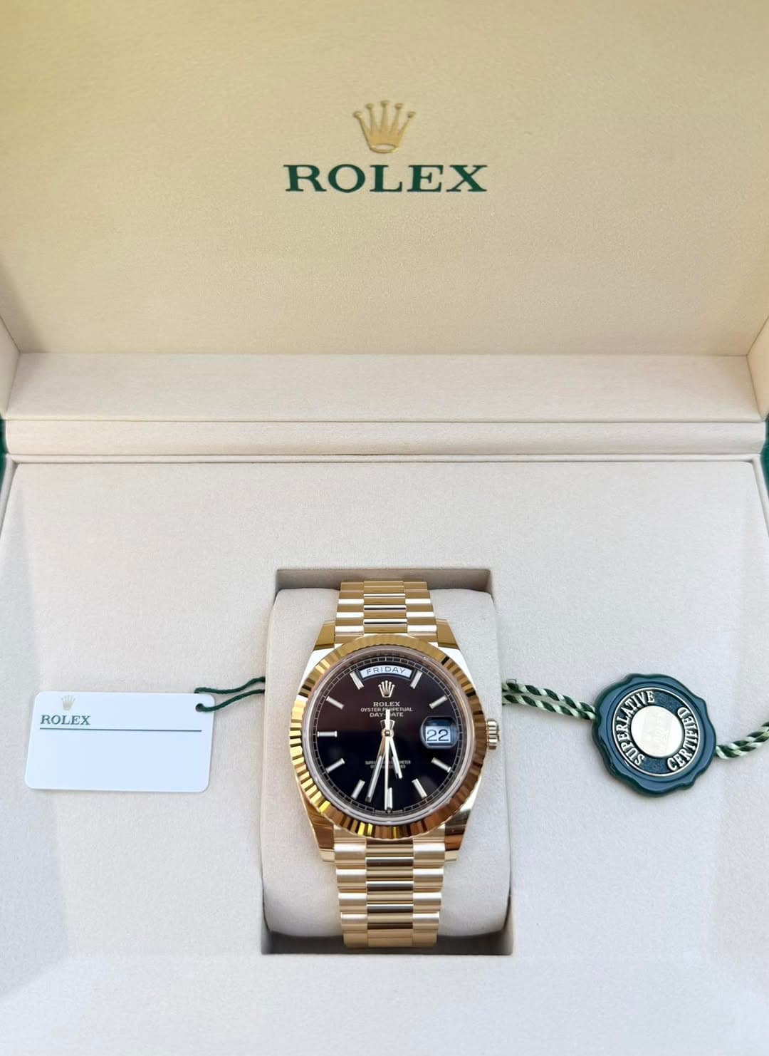 May be an image of wrist watch and text