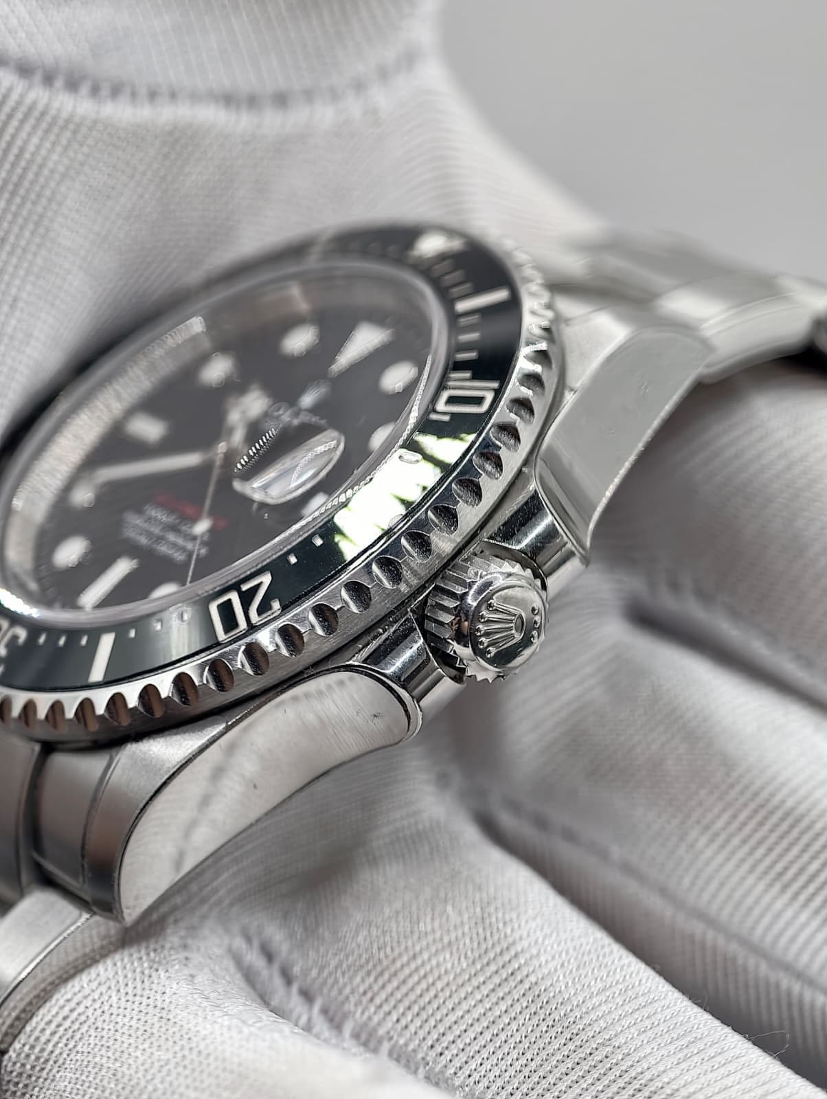 May be an image of wrist watch and text