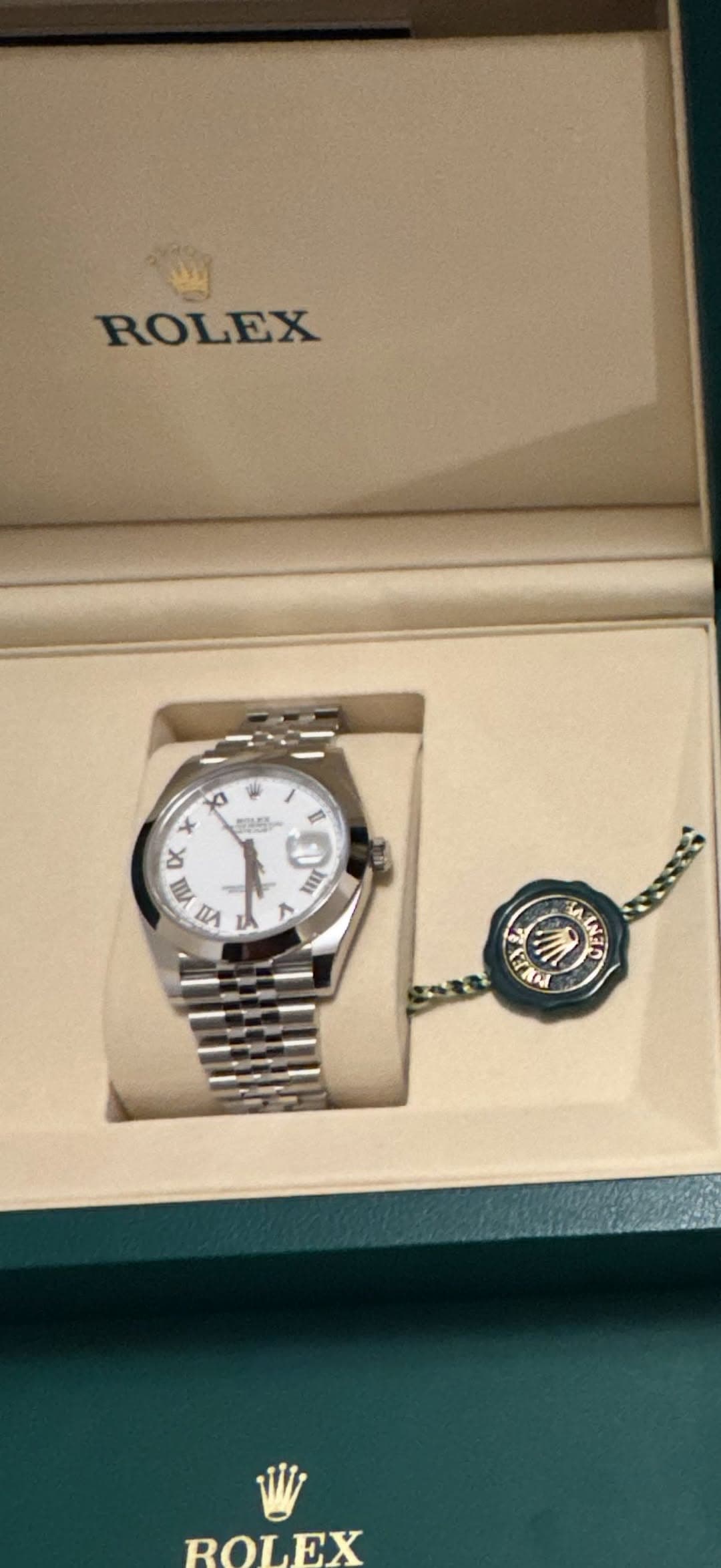 May be an image of text that says 'ROLEX XI x شي DK MIII (n nΑ Ir ٨ Χε 了さ M INER 紅 BOLEX ROI'