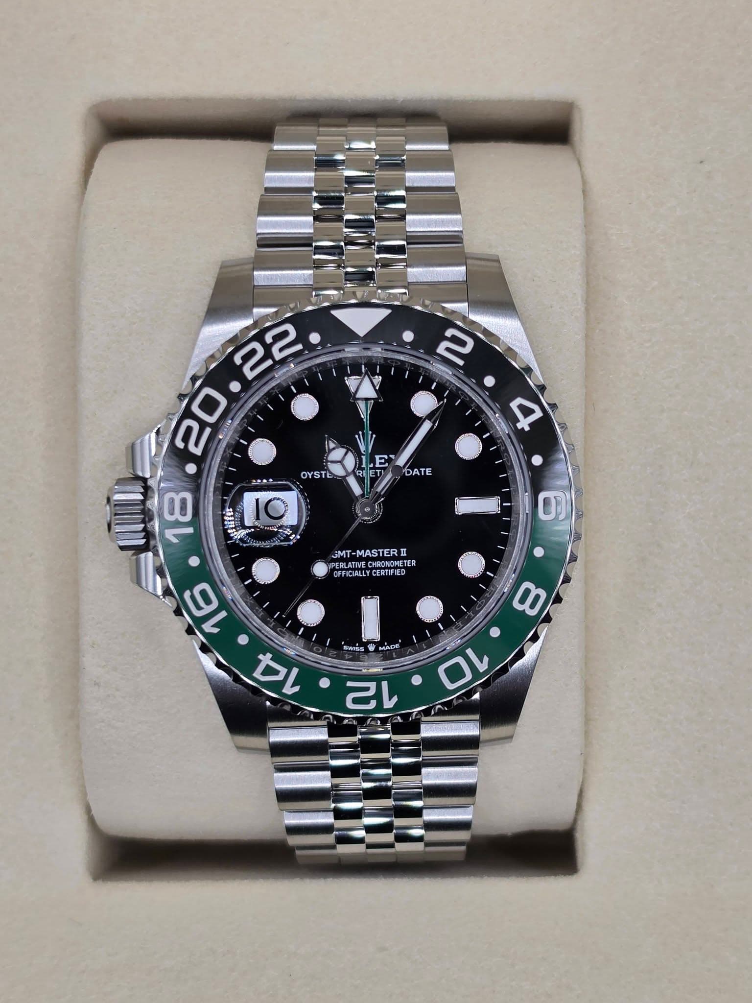 May be an image of wrist watch and text