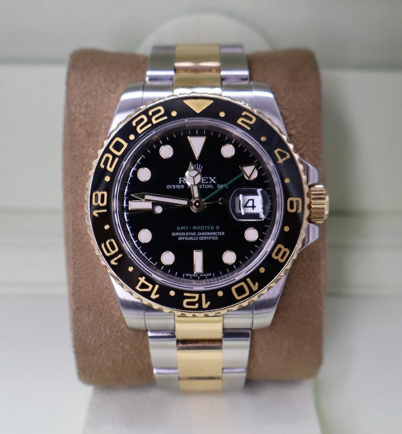 May be an image of wrist watch and text