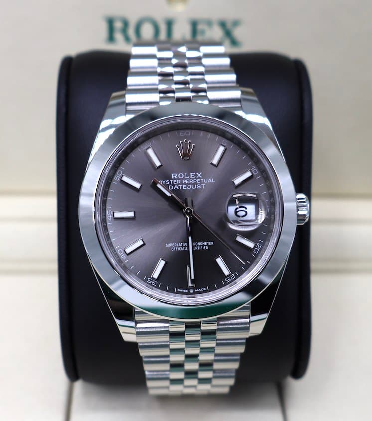 May be an image of wrist watch and text that says 'ROLEX 50 ROLEX OYST DYSTER ERPERPETUAL TUAL DATEJUST DAT TEJUST 10 45 EEAMIRSINEN () 6 SUPERLATIVE 40 AR CNOMET ER RTIFIED O 20…