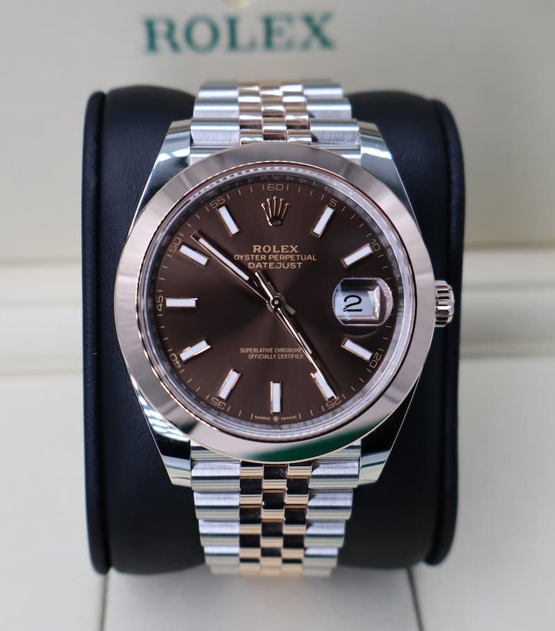 May be an image of wrist watch and text that says 'ROLEX ل ROLEX OYSTERPERPE T PERPET OYS YSTERP YST DATEJUS DATE JUST I 2 2 መ'