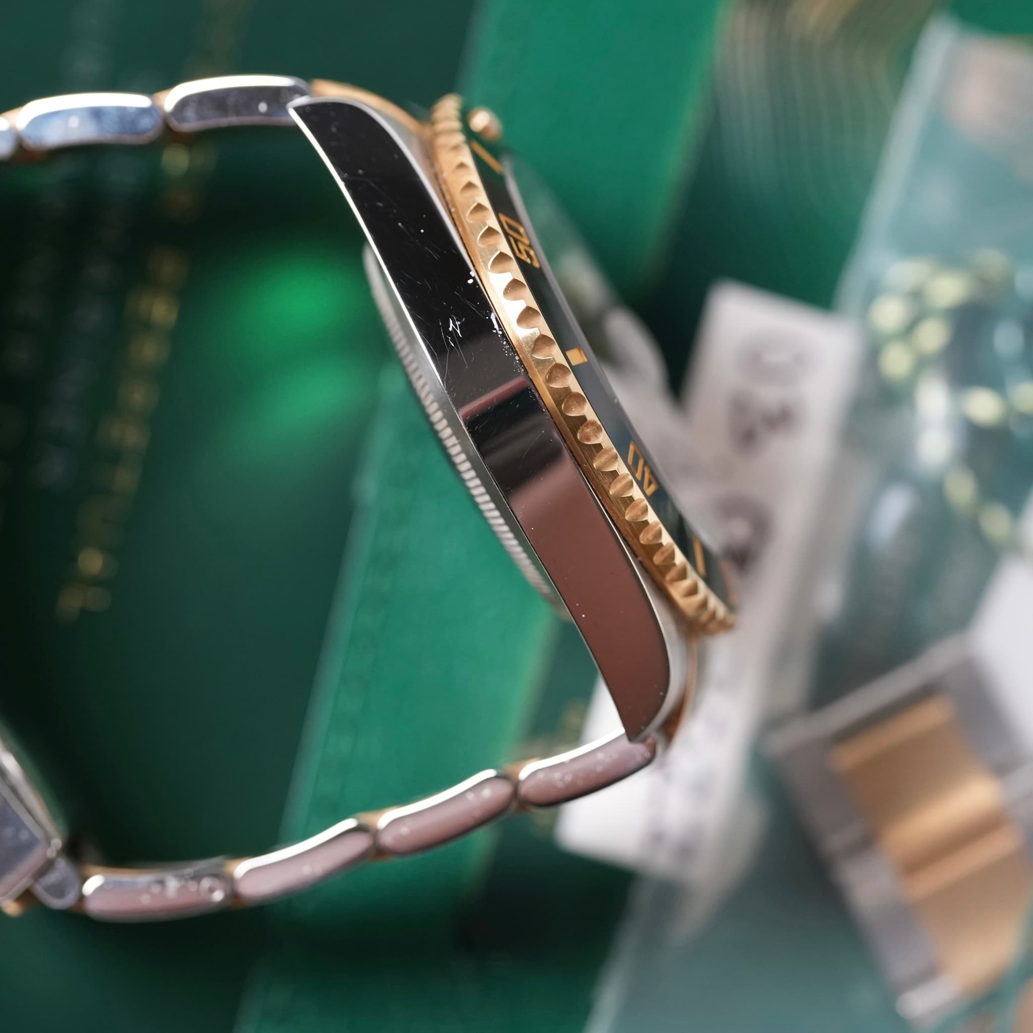 May be an image of wrist watch and text