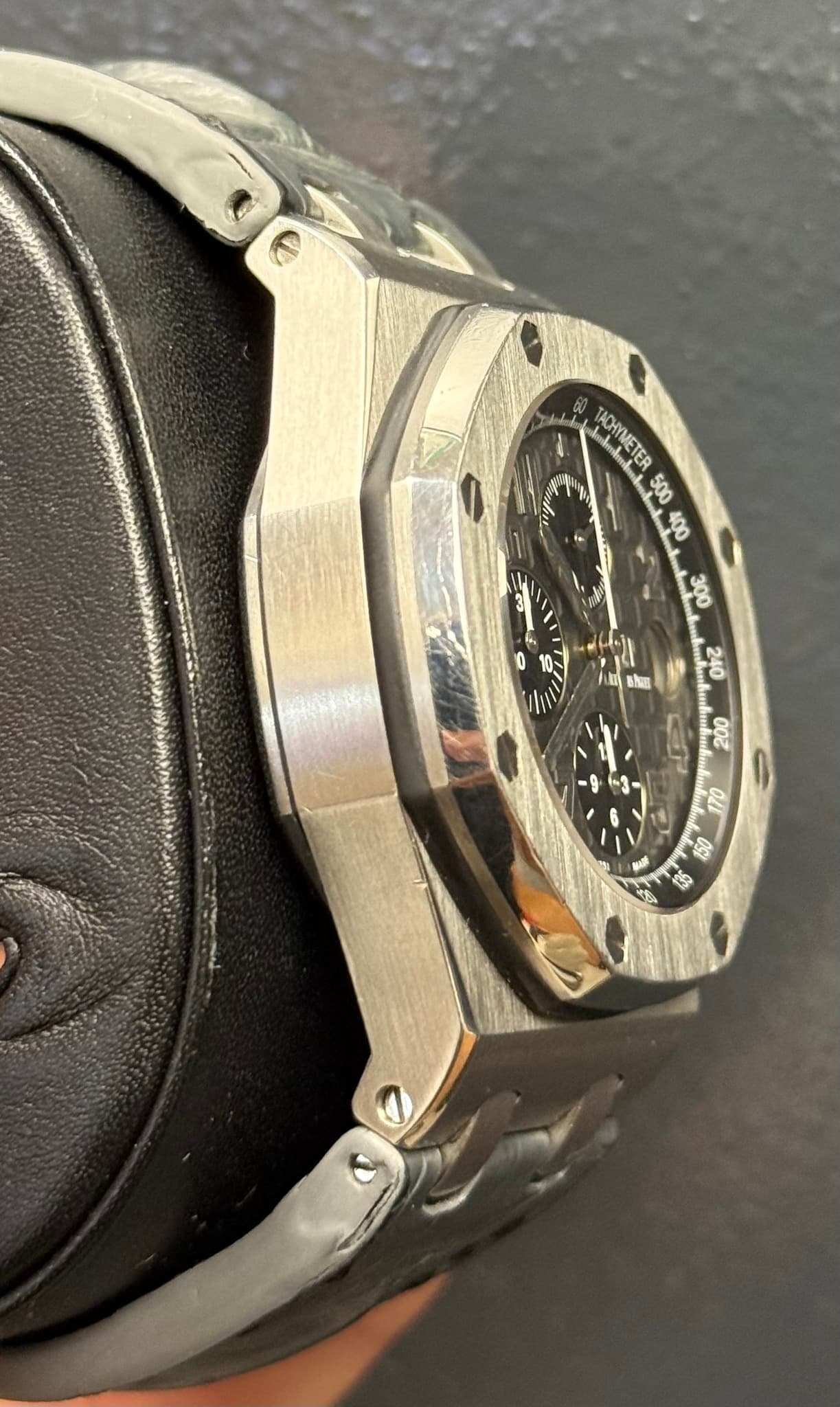 May be an image of wrist watch and text