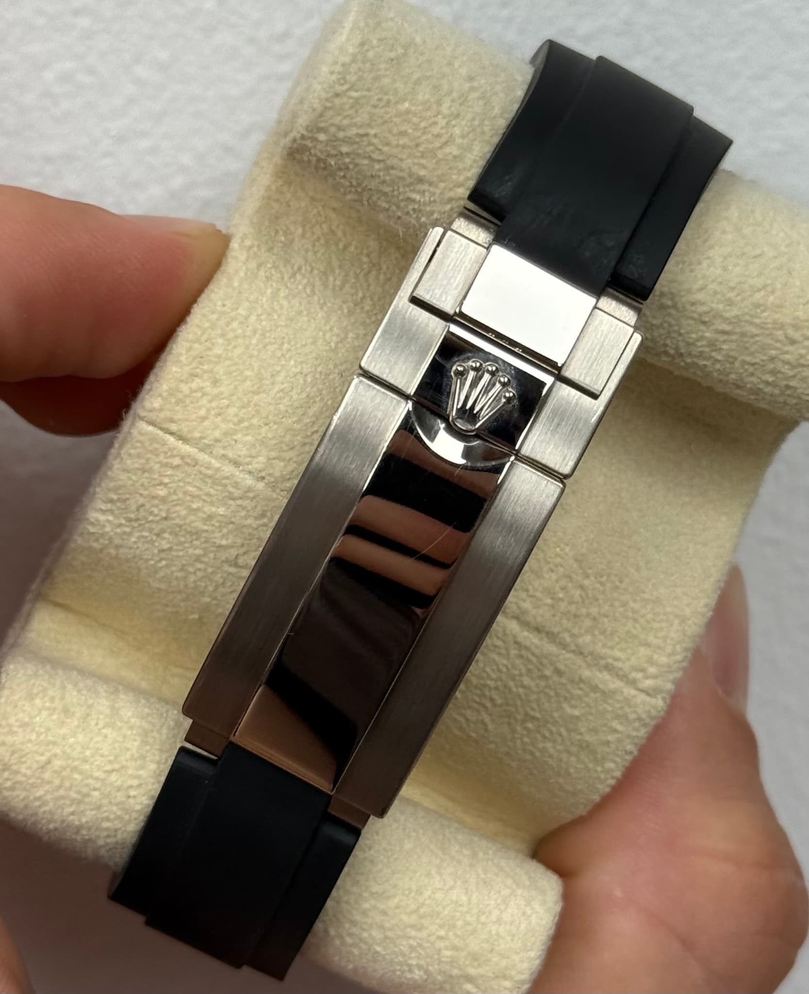 May be an image of wrist watch and text