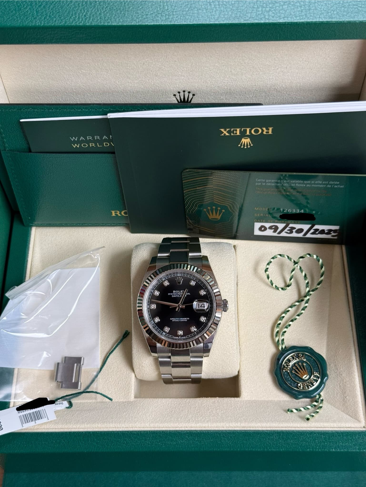 May be an image of wrist watch and text
