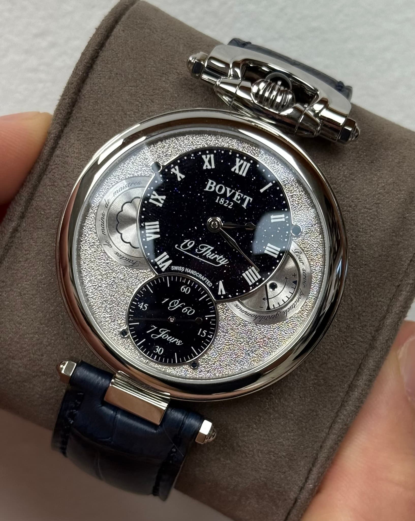 May be an image of wrist watch and text