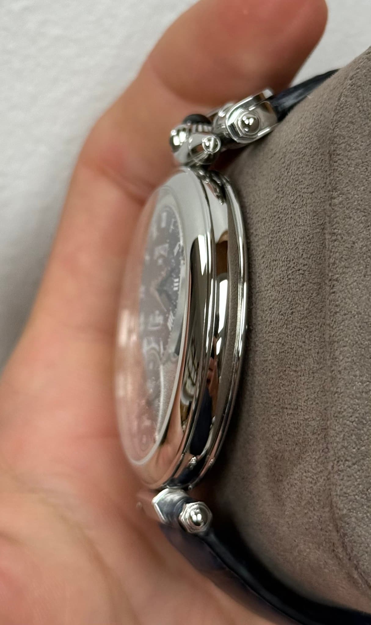 May be an image of wrist watch and text