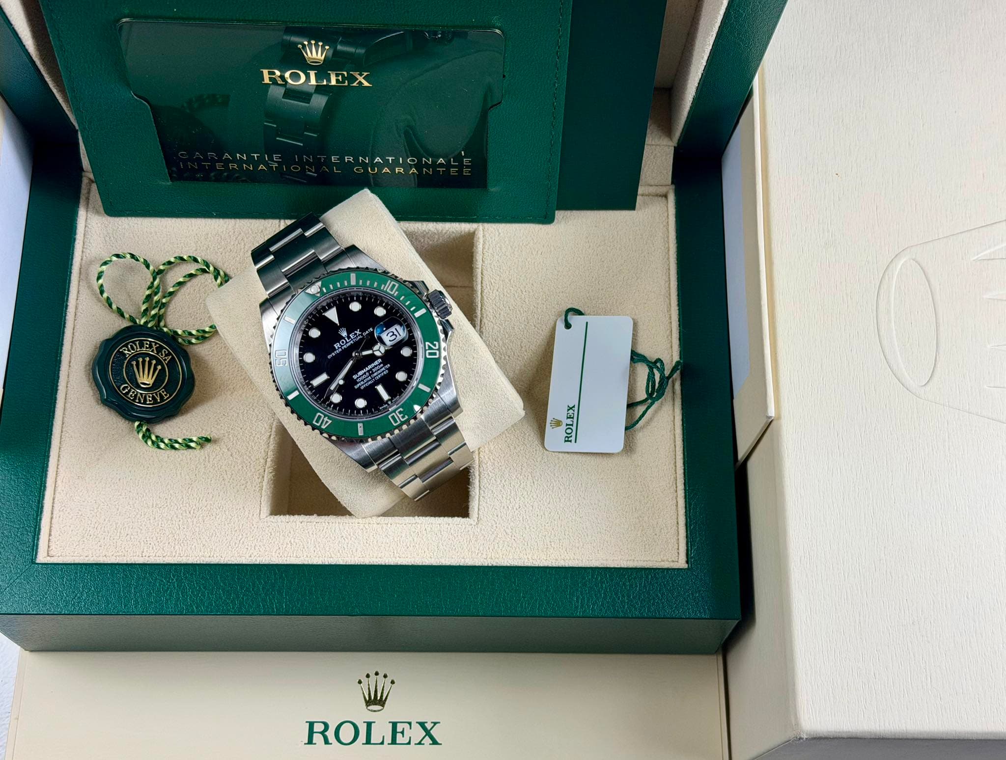May be an image of wrist watch and text that says 'تمنا ROLEX ERNATIONAL GUARA ERNATIO ,10, 5L ROLEY PASA 31 集 etttoe たな 40 S 100 MAN 20 AO ne DN UE HR e ROLEX ROLEX'