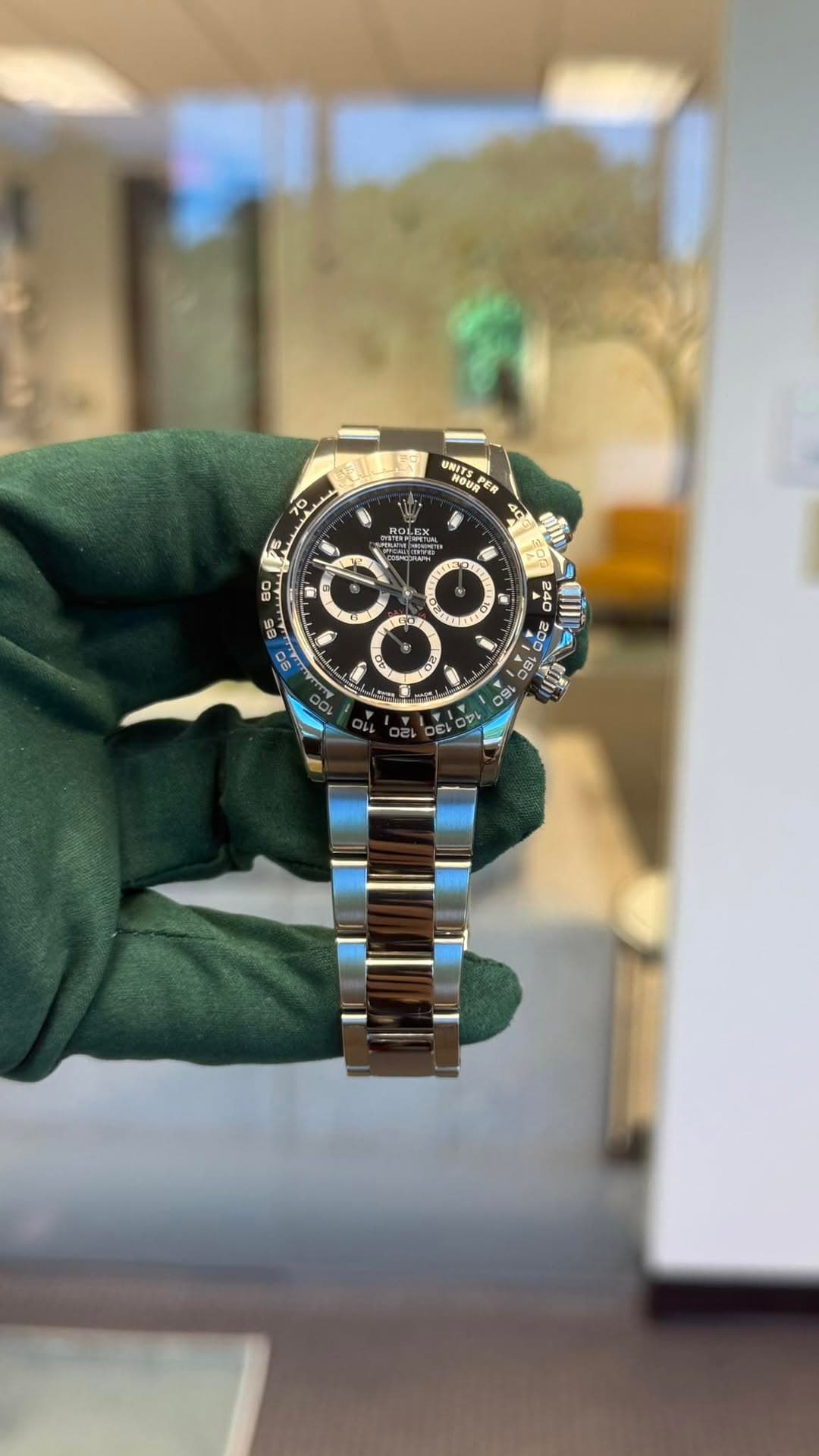 May be an image of wrist watch and text