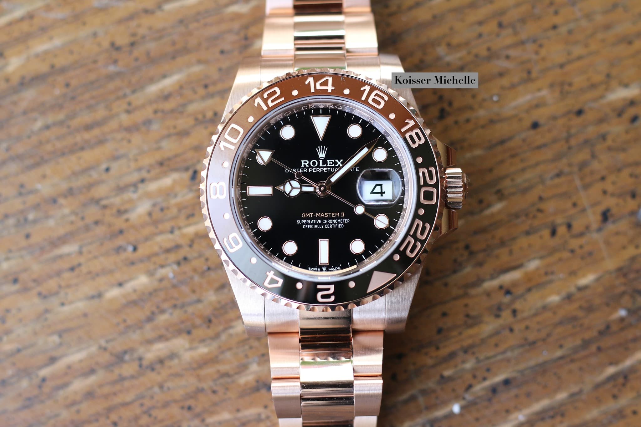 May be an image of wrist watch and text