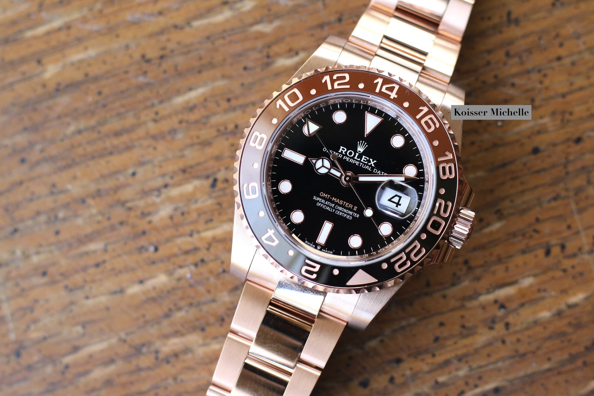 May be an image of wrist watch and text