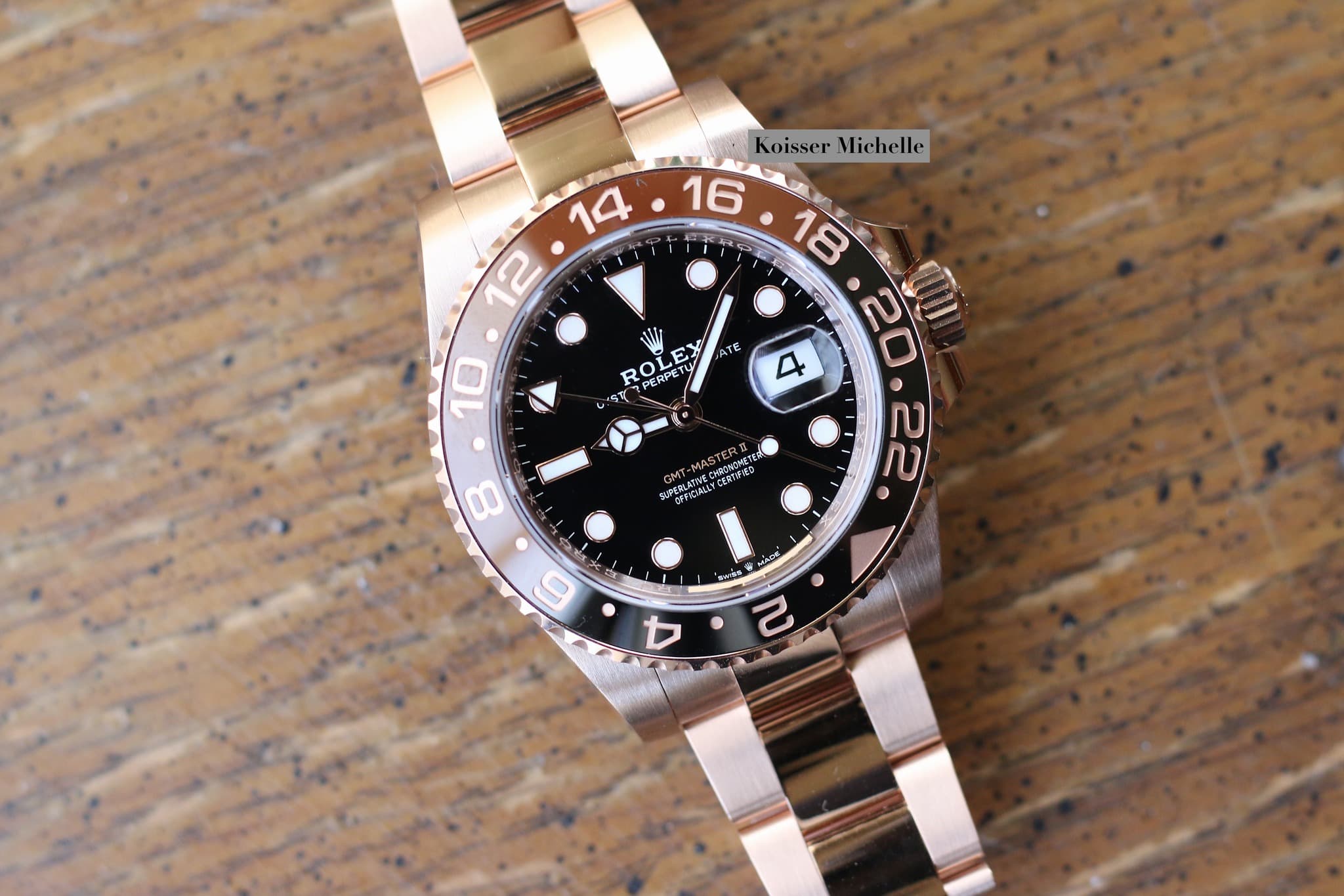 May be an image of wrist watch and text