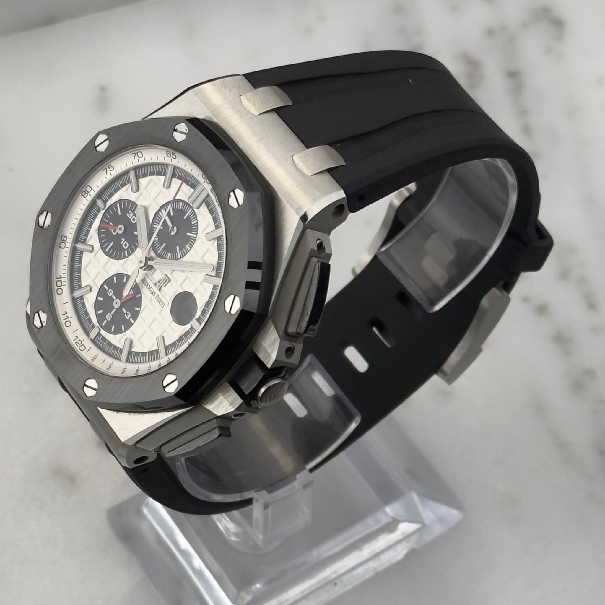May be an image of wrist watch and text