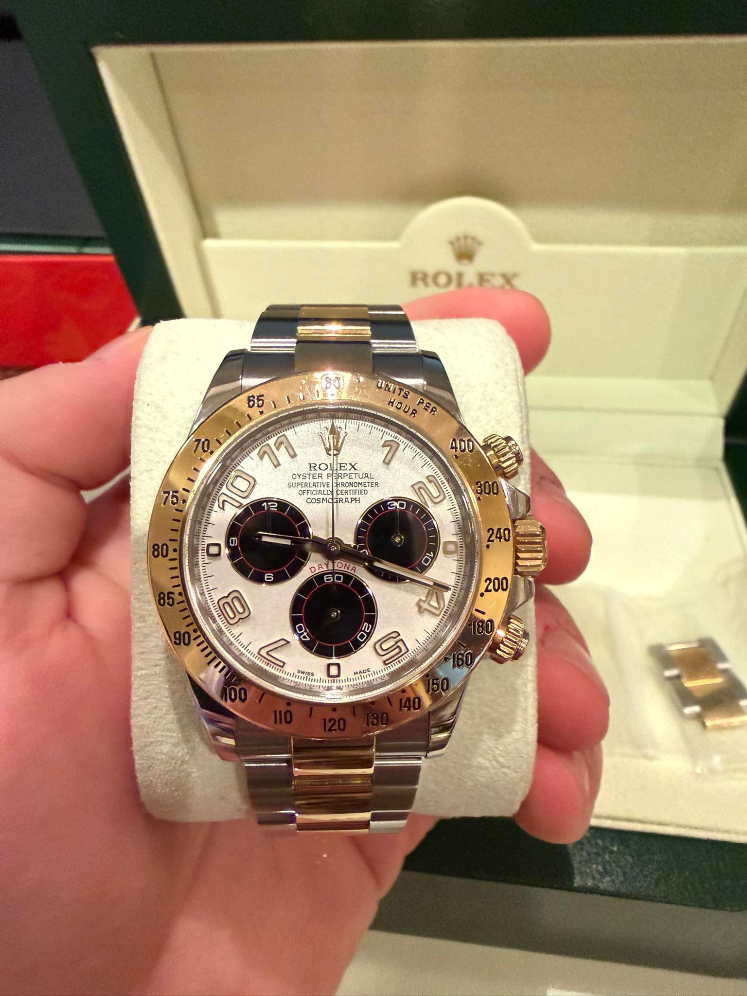 May be an image of wrist watch and text