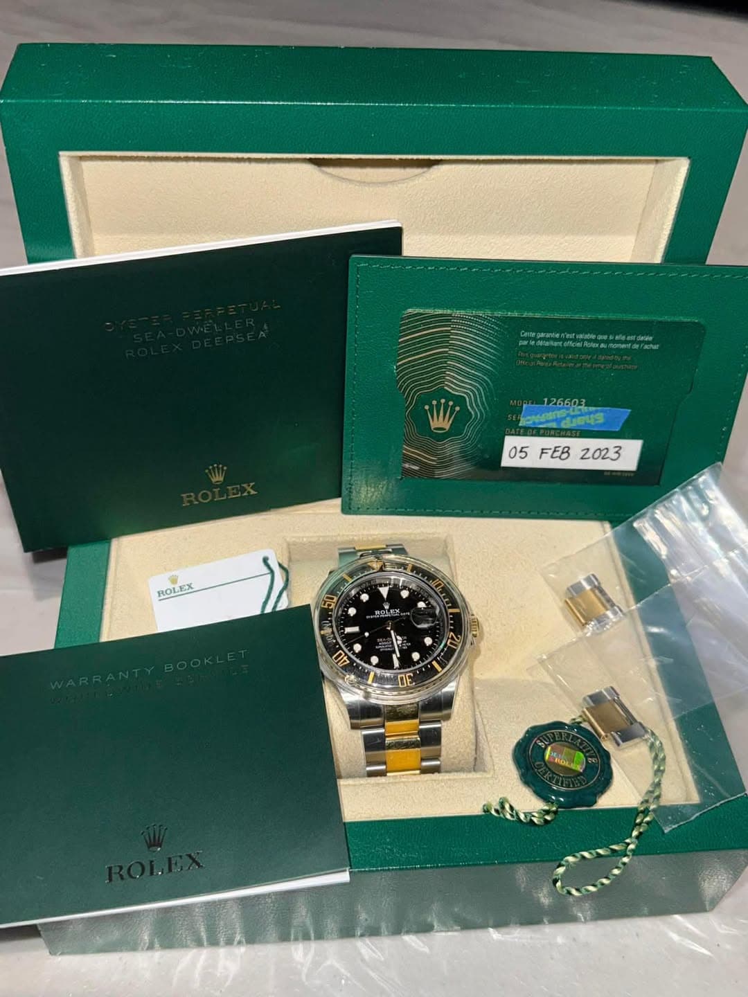 May be an image of wrist watch and text that says 'د TH 126603 da4s Taus 05 05FEB2023 FEB 2023 ROLEX X 地 인분 お二 AO S'