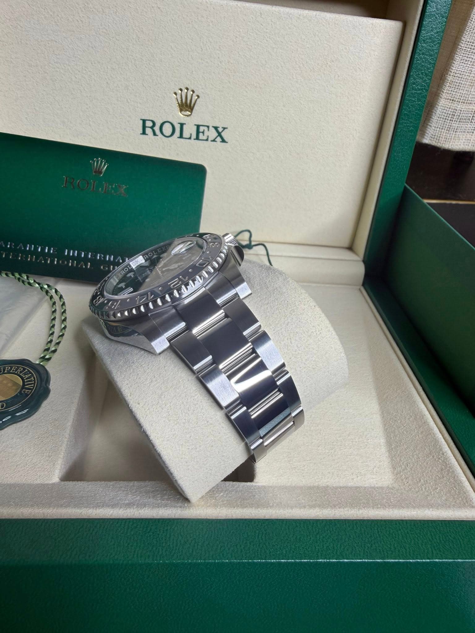 May be an image of wrist watch and text
