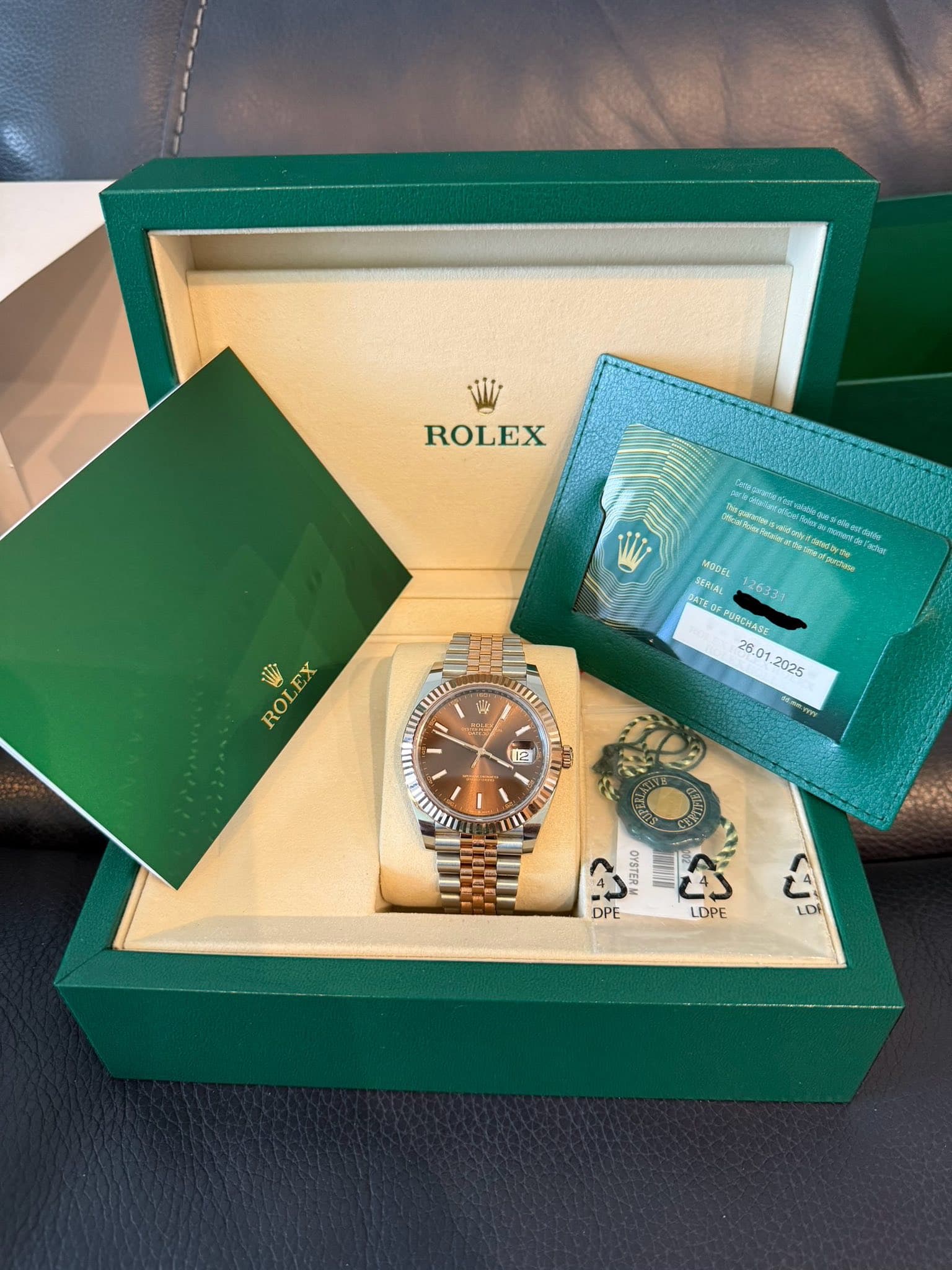 May be an image of wrist watch and text