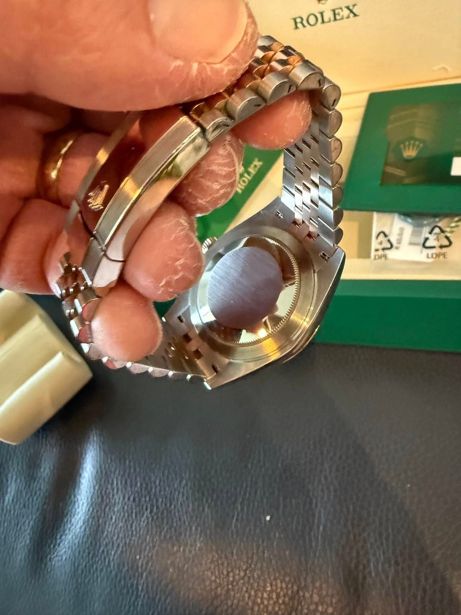 May be an image of wrist watch and text that says 'ROLEX HOLEX EX ROI DP かん is LOPE'