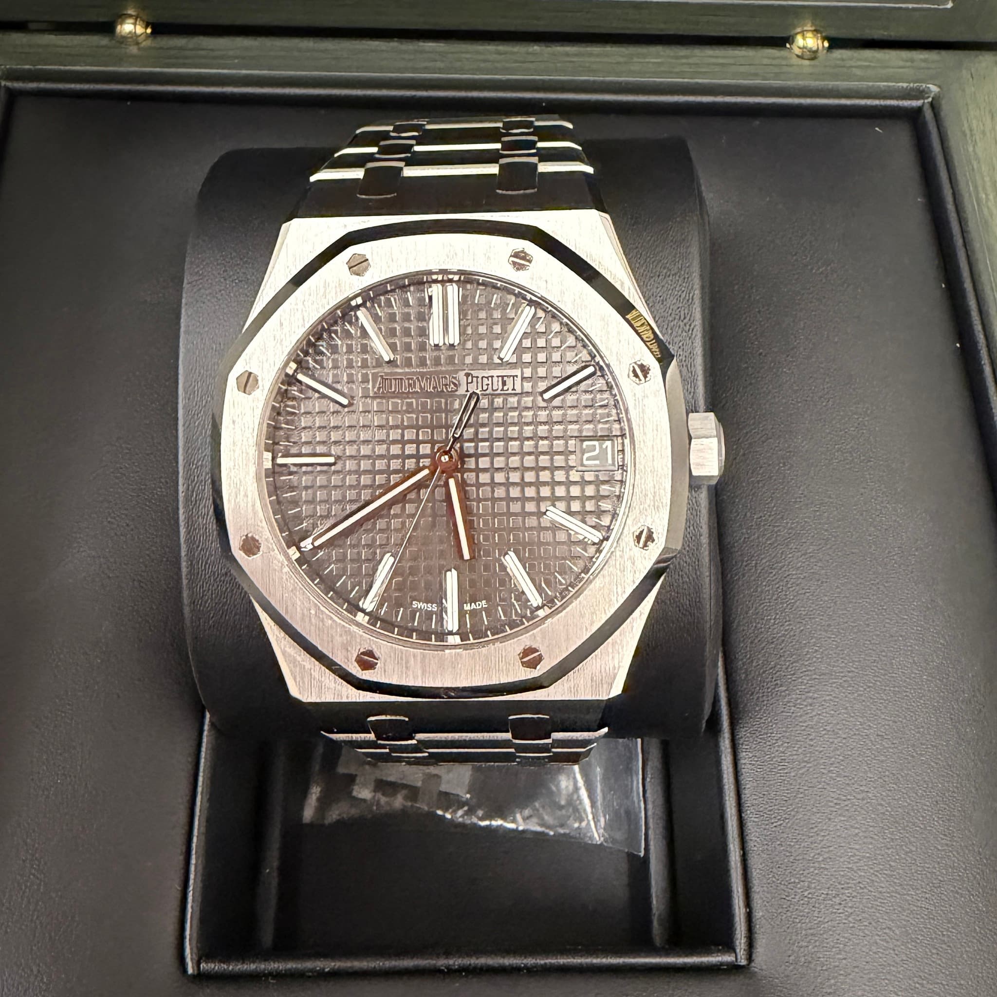 May be an image of wrist watch and text