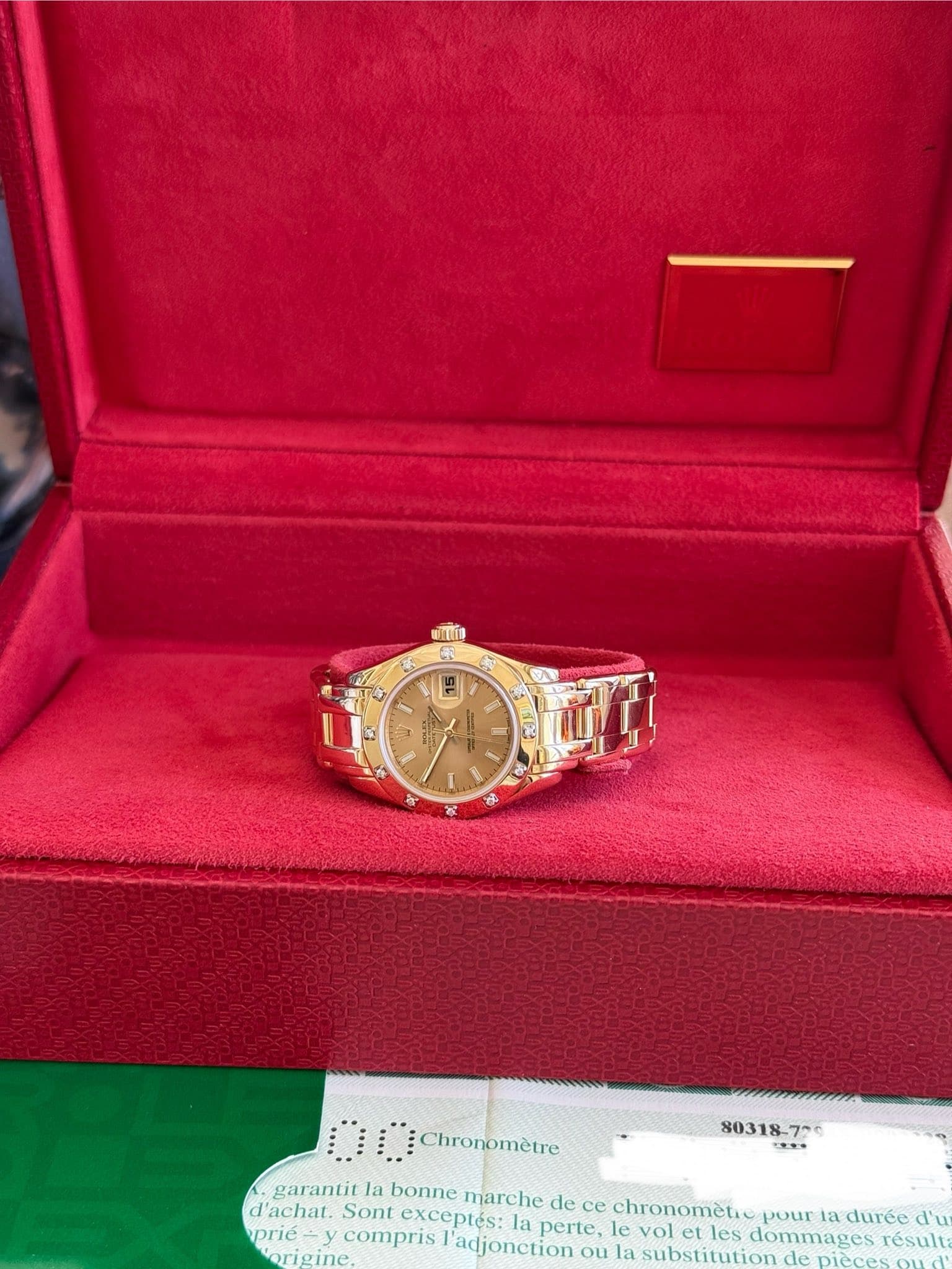 May be an image of wrist watch and text that says 'กถ่ง S 25 17 के + Chronomètre garantit la bonne marche de ce chronométi. pour a durée d'u d'achat. Sont exceptés: la perte, prie…