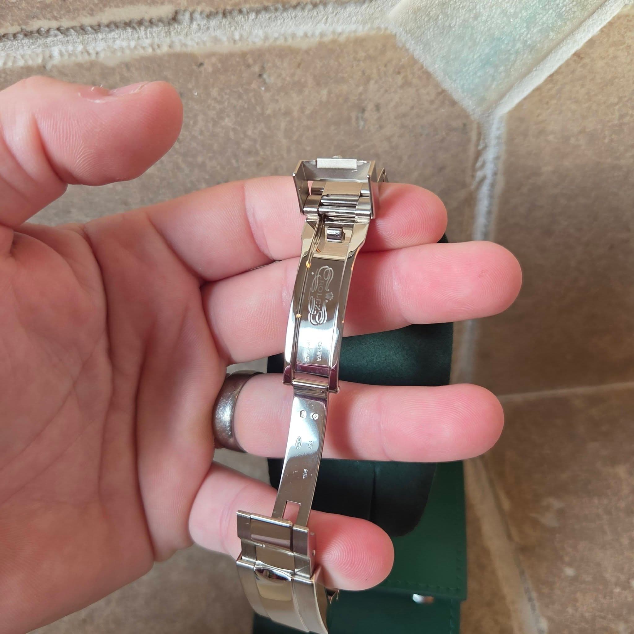 May be an image of wrist watch