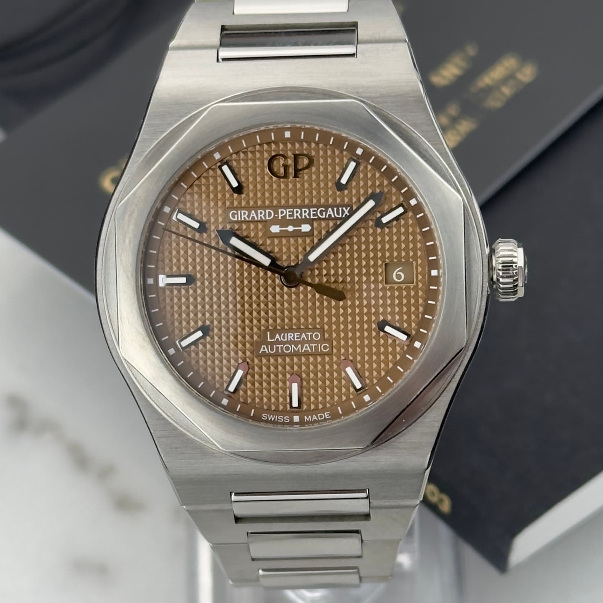 May be an image of wrist watch and text that says 'GIRARD- GIRARD-PERREGAUX PERREGAUX 6 AUREATO AUTOMATIC OMATIC SWISS MADE'