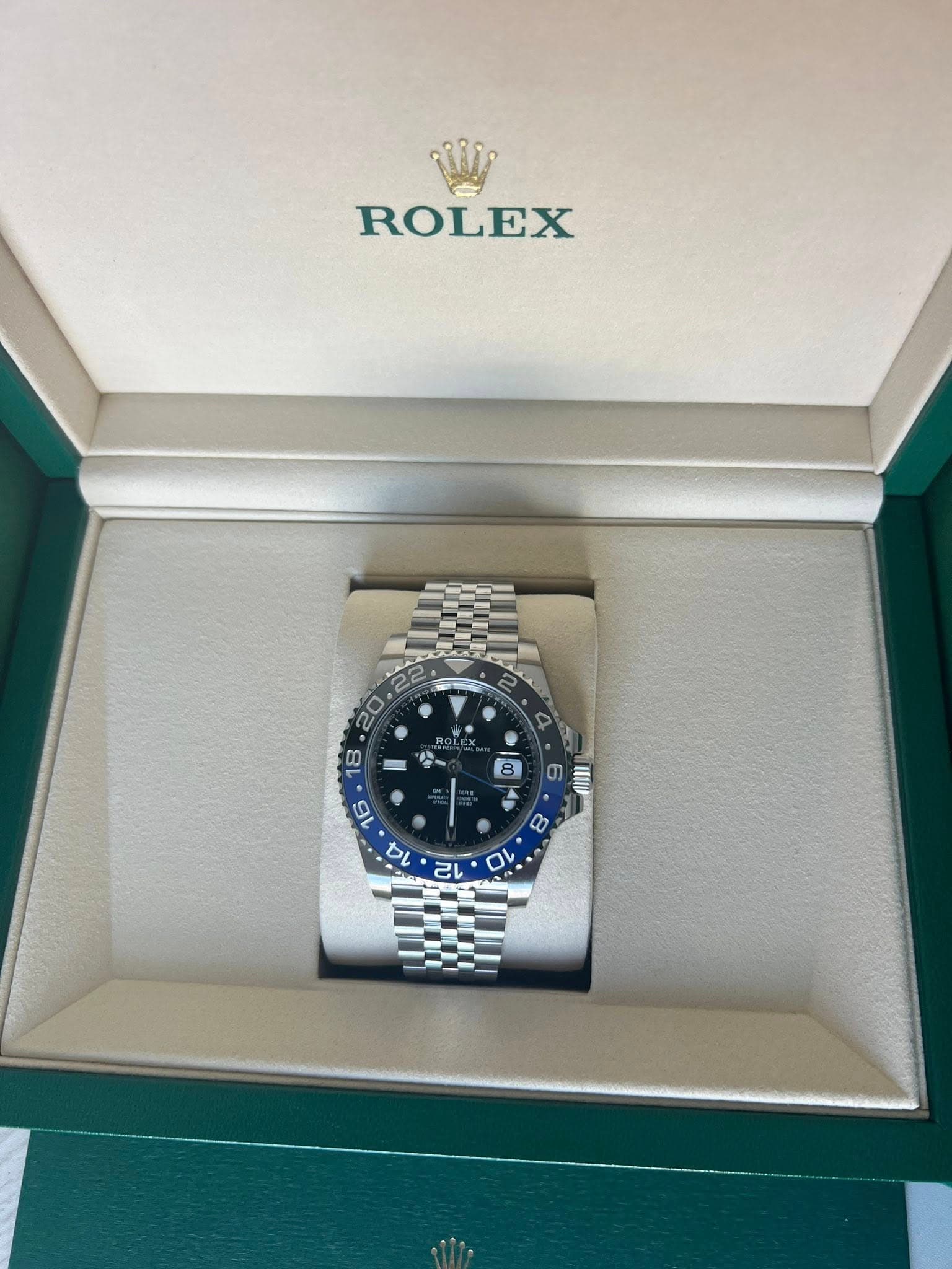 May be an image of wrist watch and text
