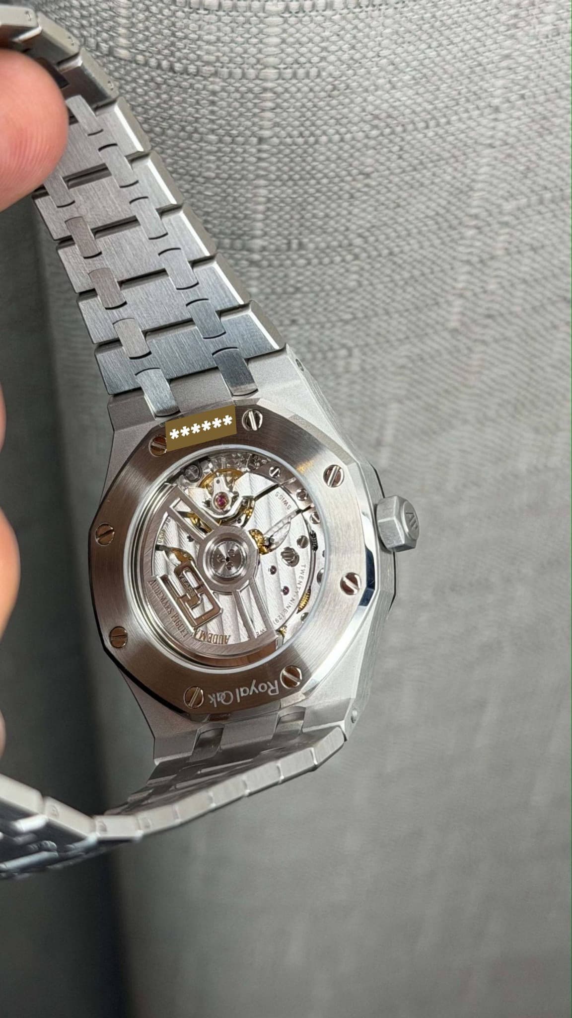 May be an image of wrist watch and text