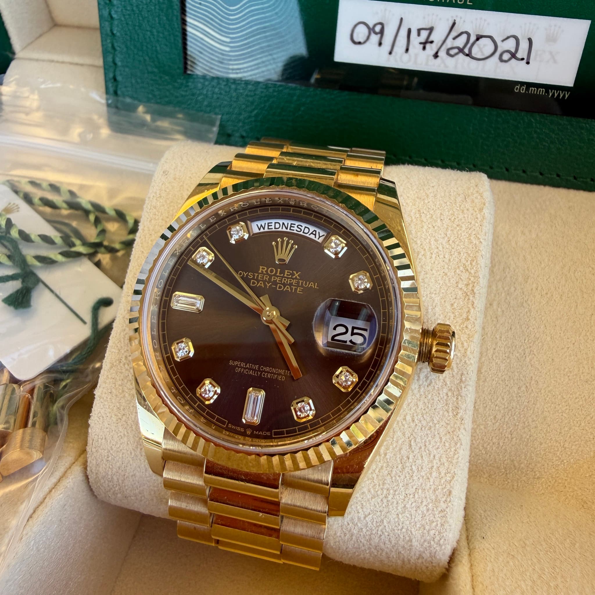 May be an image of wrist watch and text
