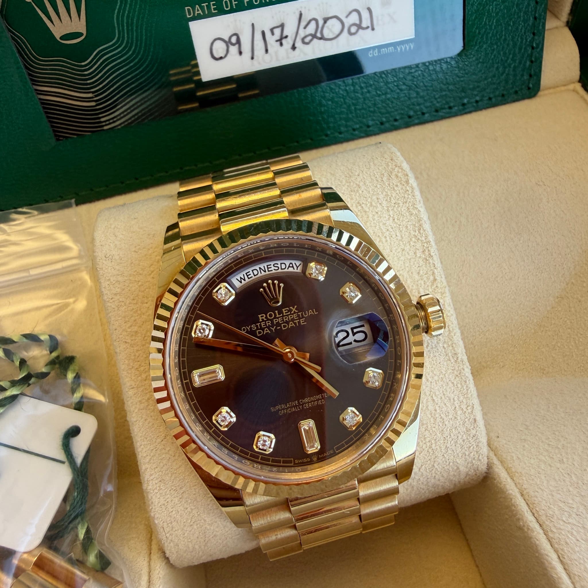 May be an image of wrist watch and text