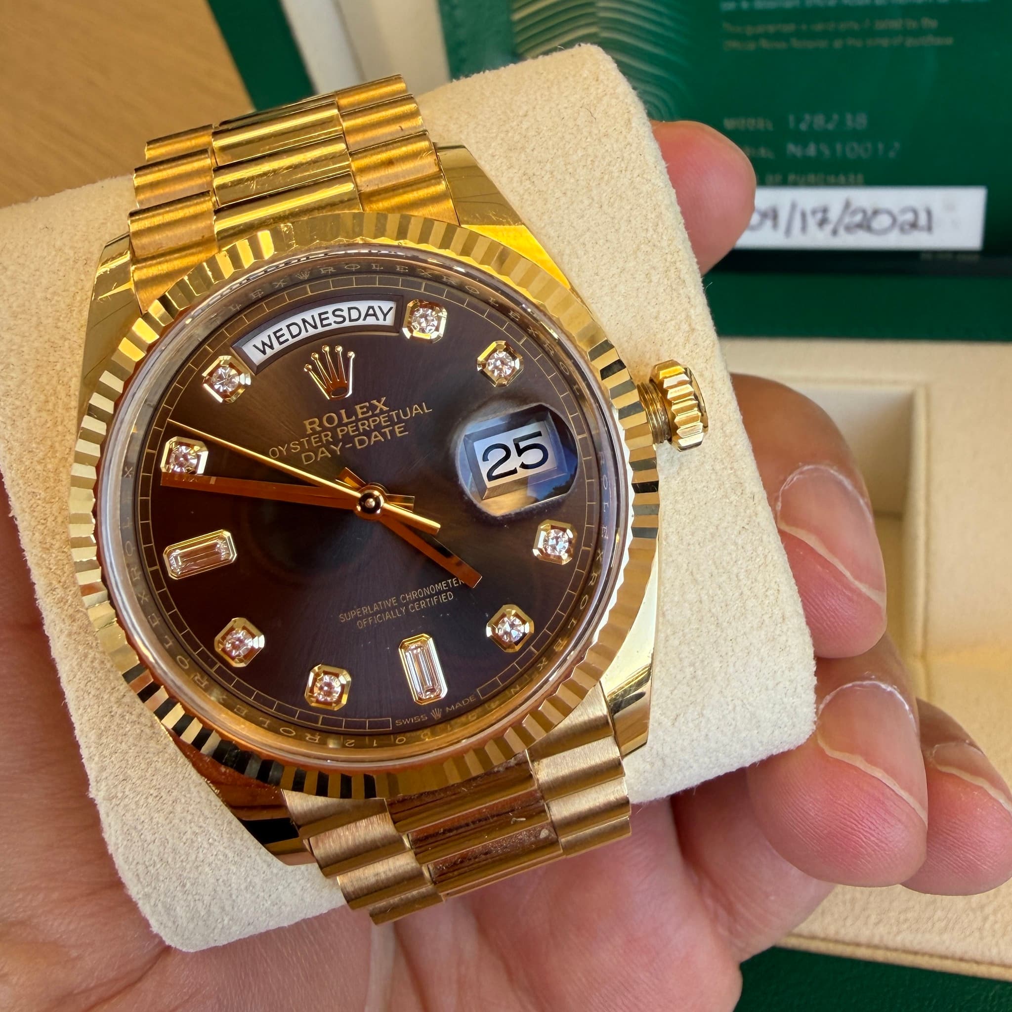 May be an image of wrist watch and text