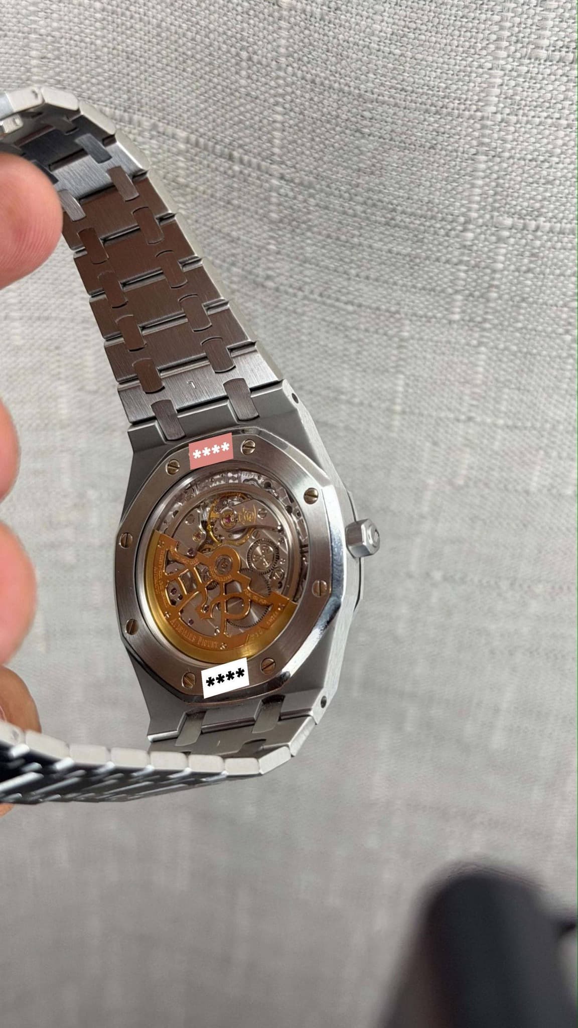 May be an image of wrist watch and text