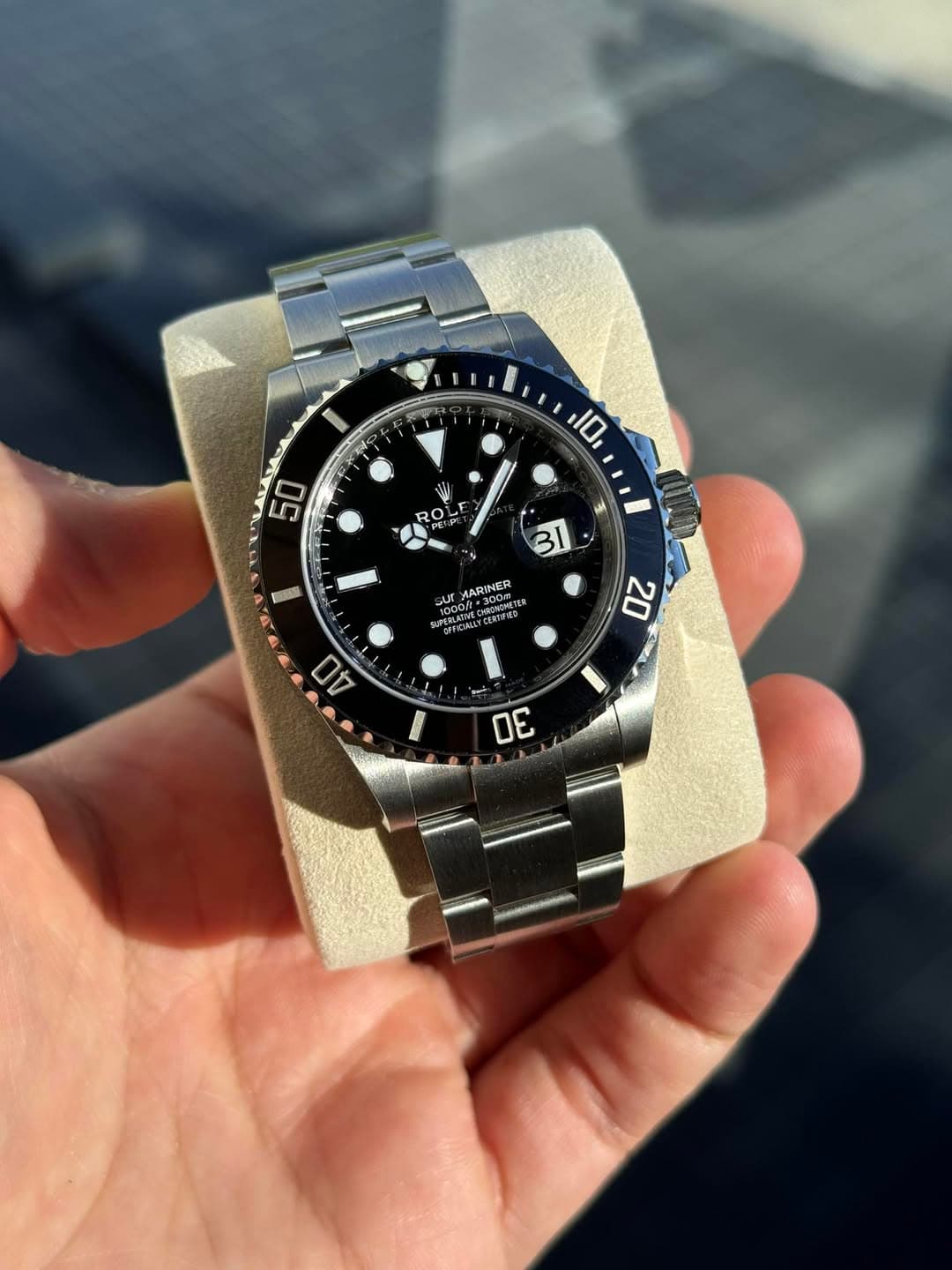 May be an image of wrist watch and text