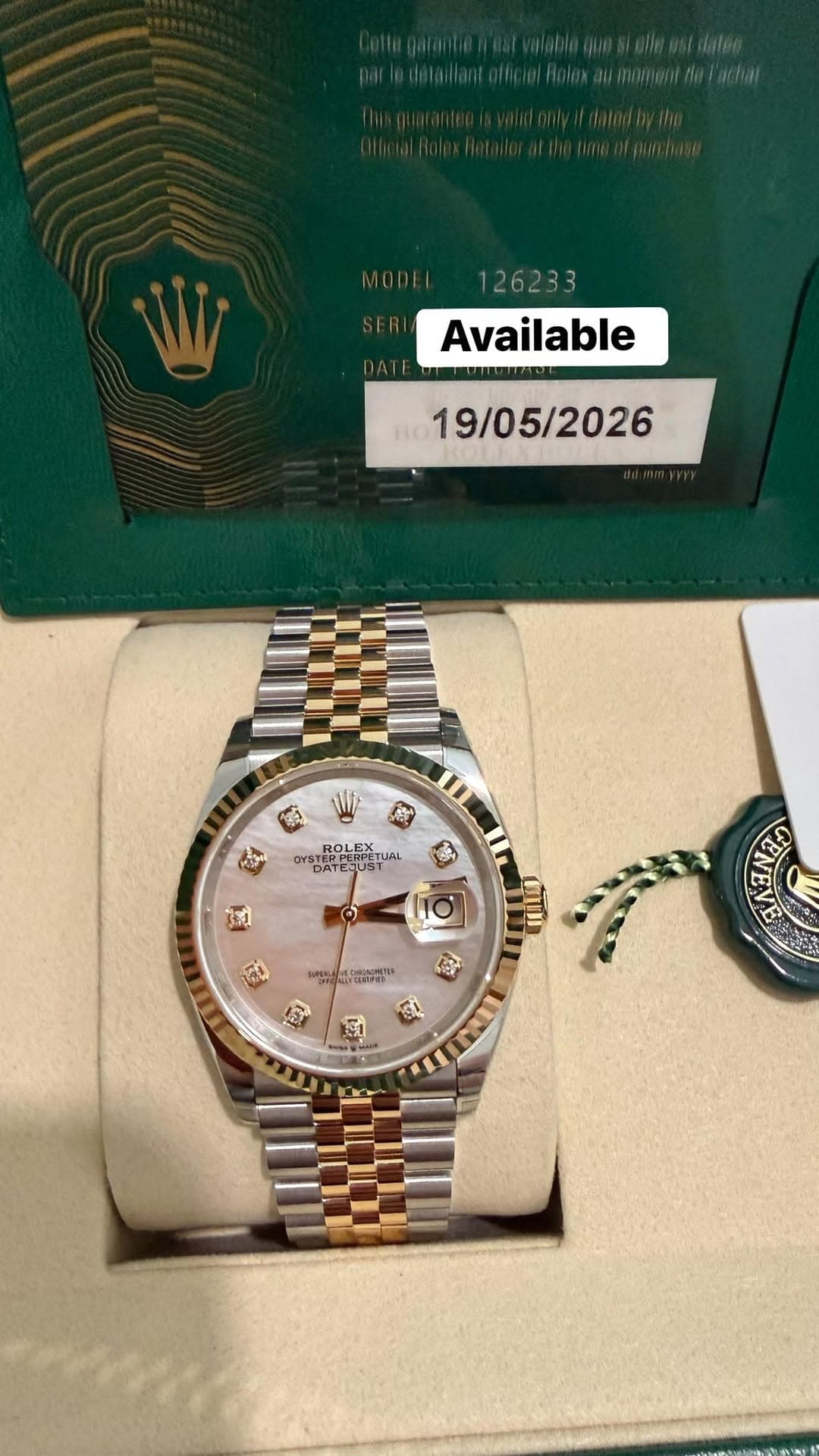 May be an image of wrist watch and text