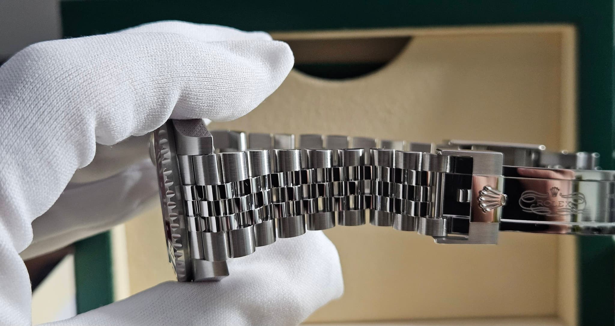 May be an image of wrist watch and text