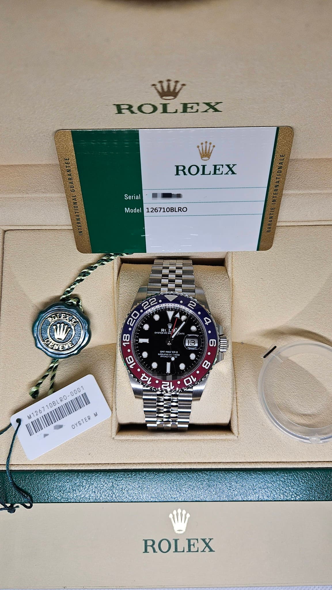 May be an image of wrist watch and text that says 'WV ROLEX ROLEX Serial Model126710BLRO Model 126710BLRO w EA O ی= 12 KTmAKa 6 6 LIA QU 元 10BLRO RO. 0001 125 超.清排 OYSTER…