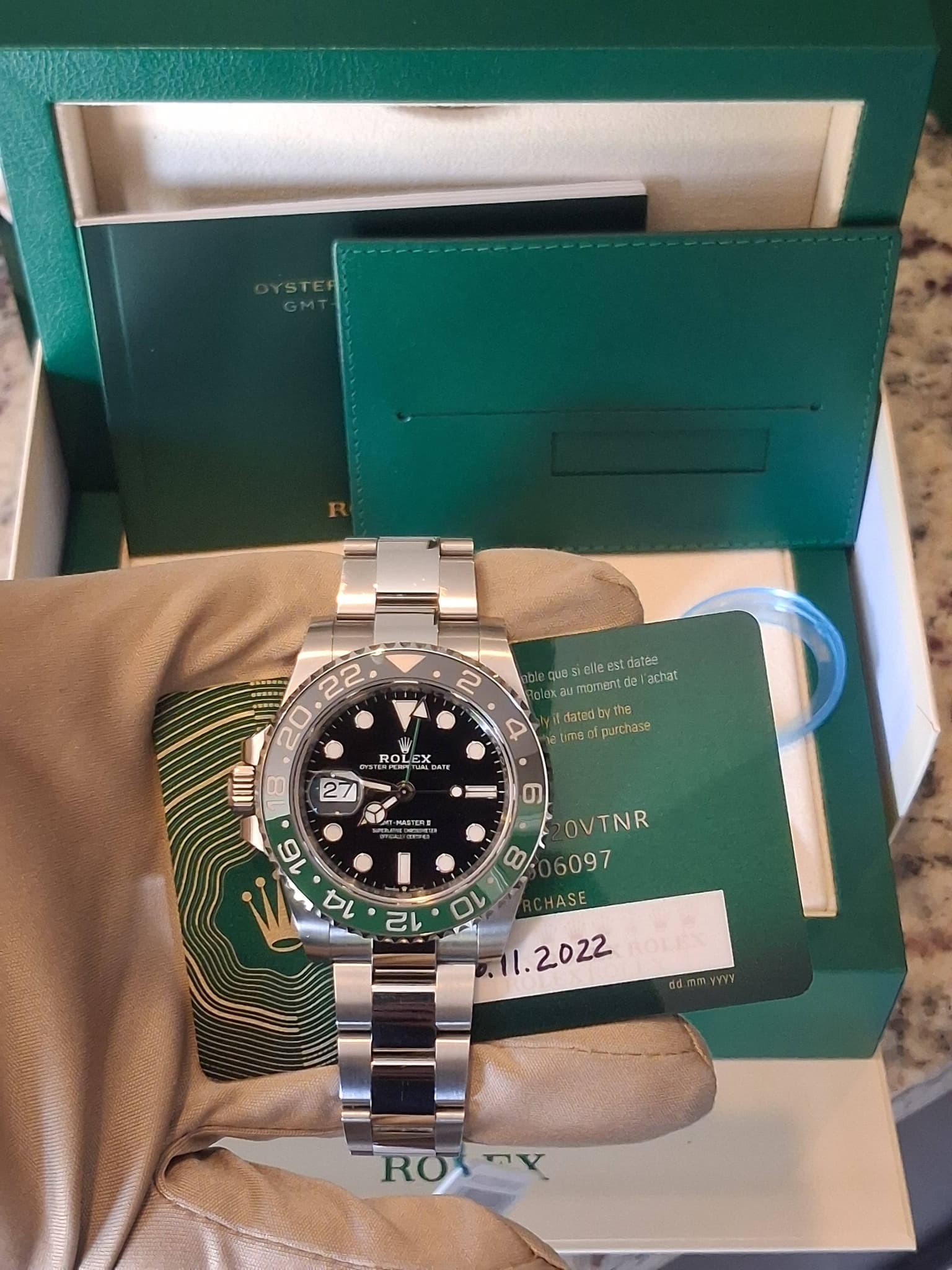 May be an image of wrist watch and text